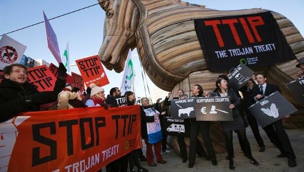 Activists protest the TTIP, calling it a trojan horse treaty.