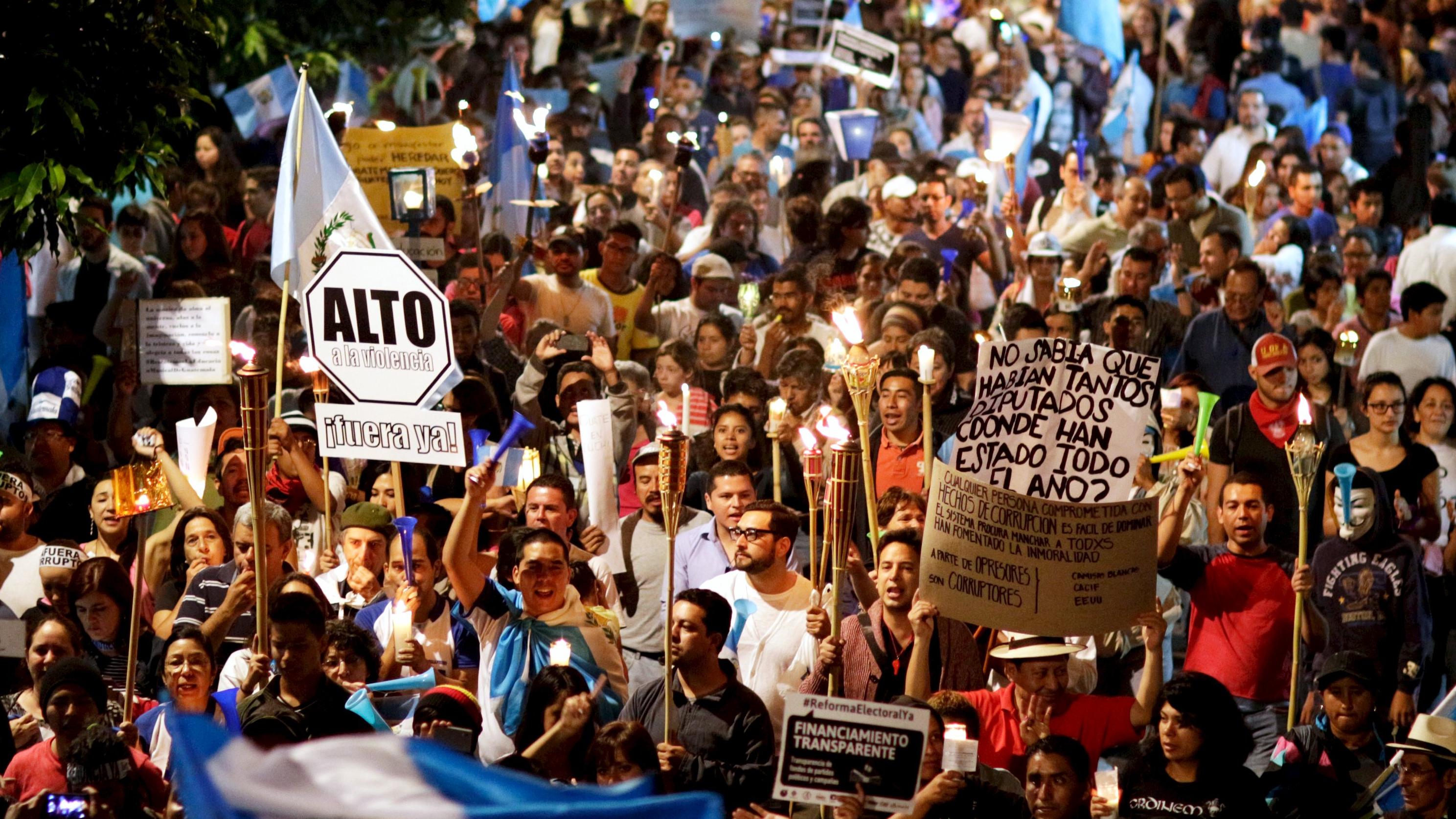 Protesters demand the resignation of President Otto Perez Molina, in Guatemala City, July 4, 2015.