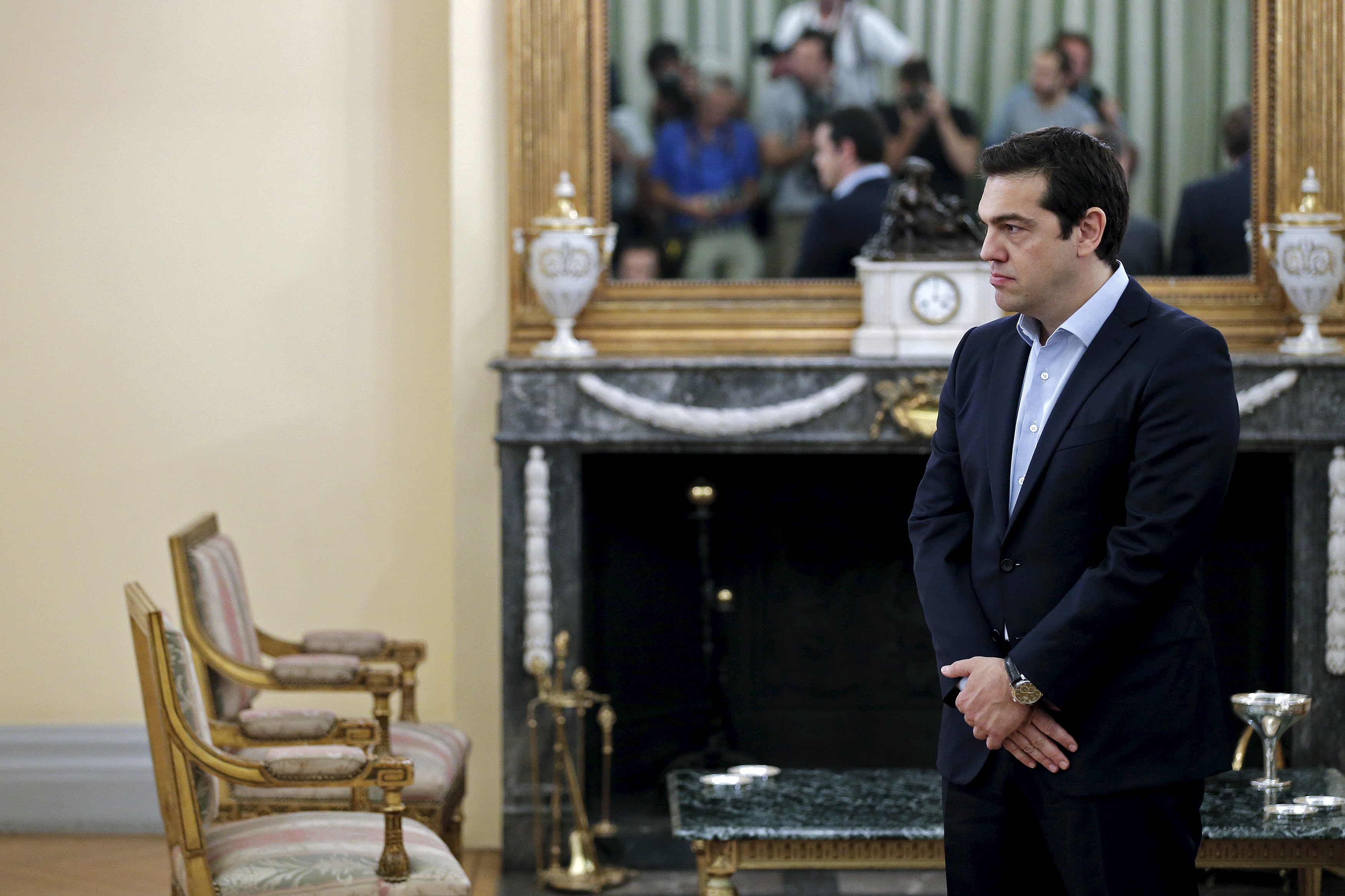 Tsipras' new government was sworn in on Saturday after a reshuffle expelled dissidents from his cabinet and began a new phase of negotiations for a third bailout package.