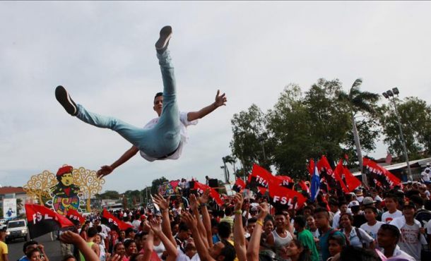 A youth is thrown in the air during celebrations in Nicaragua Friday July 17, 2015, marking the day the former Dictator Somoza resigned 36 years ago.