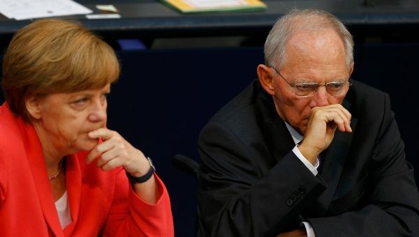 German Chancellor Angela Merkel and Finance Minister Wolfgang Schaeuble attend the session of Germany's parliament, the Bundestag, in Berlin, Germany, July 17, 2015. 