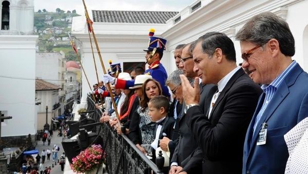 Xavier Lasso (R) stands beside President Rafael Correa at the presidential palace during a changing of the guard ceremony January 19, 2015.