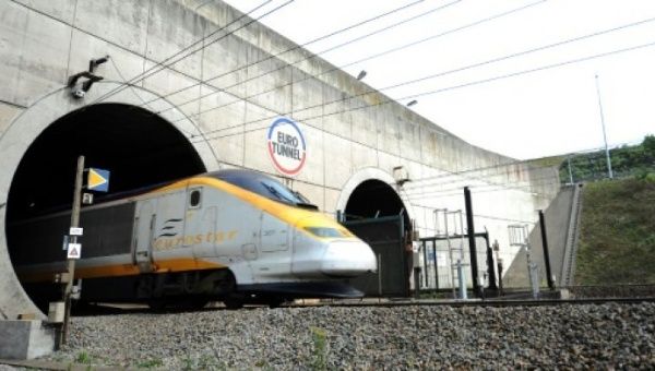 Migrant-refugees disrupted the Channel Tunnel overnight at the French port of Calais connecting the United Kingdom and France.