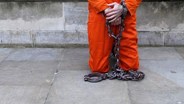 A demonstrator in London protests against the U.S. prison at Guantánamo Bay.