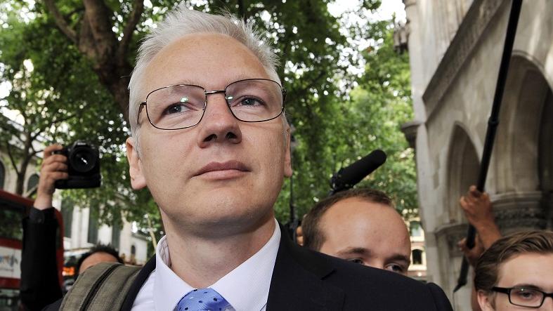 Julian Assange arrives at the High Court in London, on July 12, 2011