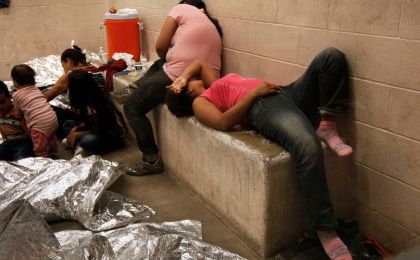 Immigrants who have been caught crossing the border illegally are housed inside the McAllen Border Patrol Station in McAllen, Texas on July 15, 2014, where they are processed.