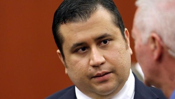 George Zimmerman talks to court personnel during the 15th day of his trial in Seminole circuit court, in Sanford, Florida, USA, June 28, 2013.