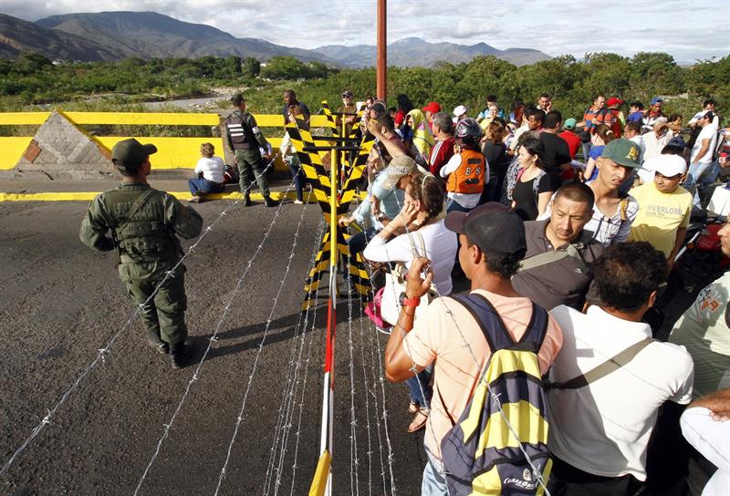 Venezuela's President Nicolas Maduro late Wednesday ordered two border crossings to Colombia closed for 72 hours after a shoot-out left three soldiers injured.