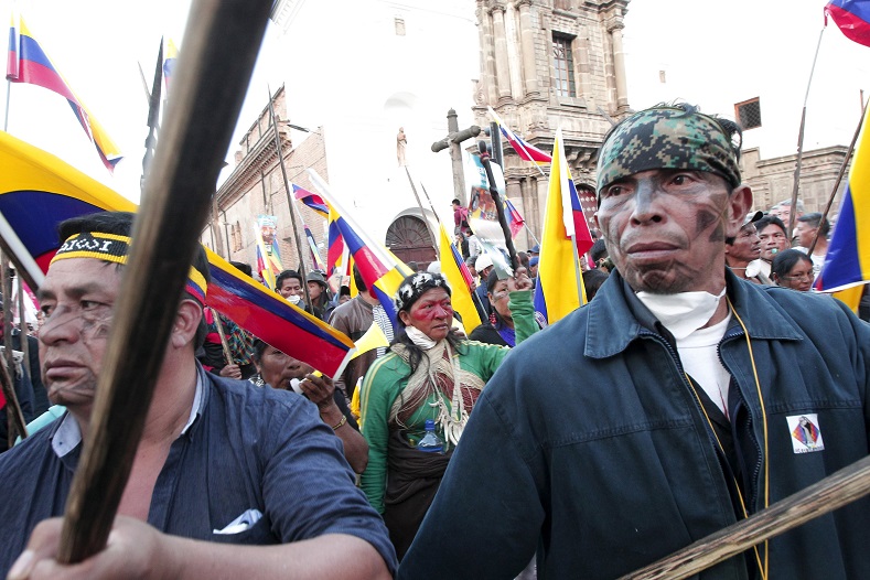 Indigenous people from the Confederation of Indigenous Nationalities of Ecuador (CONAIE) march during a protest against the government of Ecuador's President Rafael Correa in Quito, Ecuador, August 19, 2015.