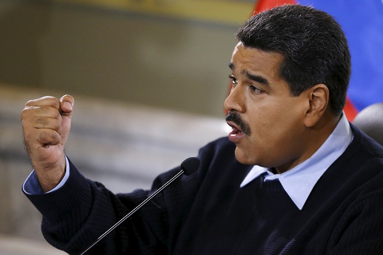 Venezuela's President Nicolas Maduro gestures as he speaks during a news conference at Miraflores Palace in Caracas August 24, 2015.