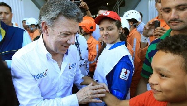 President Juan Manuel Santos says he is committed to helping recently deported Colombians.