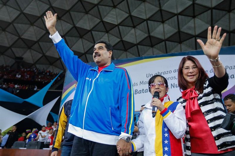 President Nicolas Maduro with First Lady Cilia Flores at a woman's conference in Caracas.