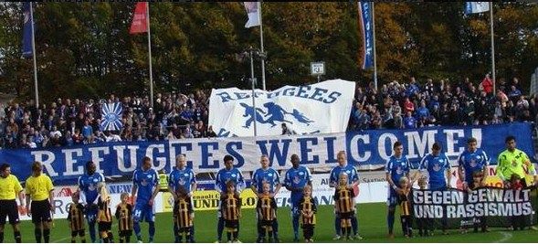 Soccer fans in Germany showing support for refugees.