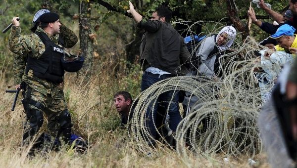 Refugees trying to cross the border from Greece into Macedonia are met with violence from border guards. 