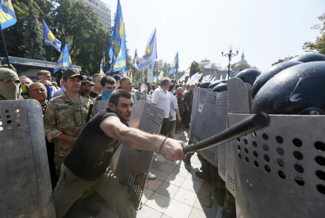 Right wing nationalists clash with police outside the parliament in Kiev Aug. 31, 2015.