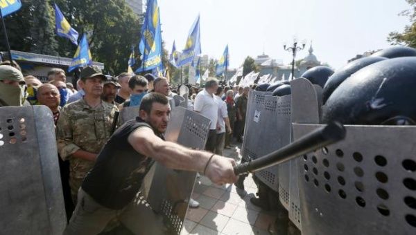 Right wing nationalists clash with police outside the parliament in Kiev Aug. 31, 2015. 