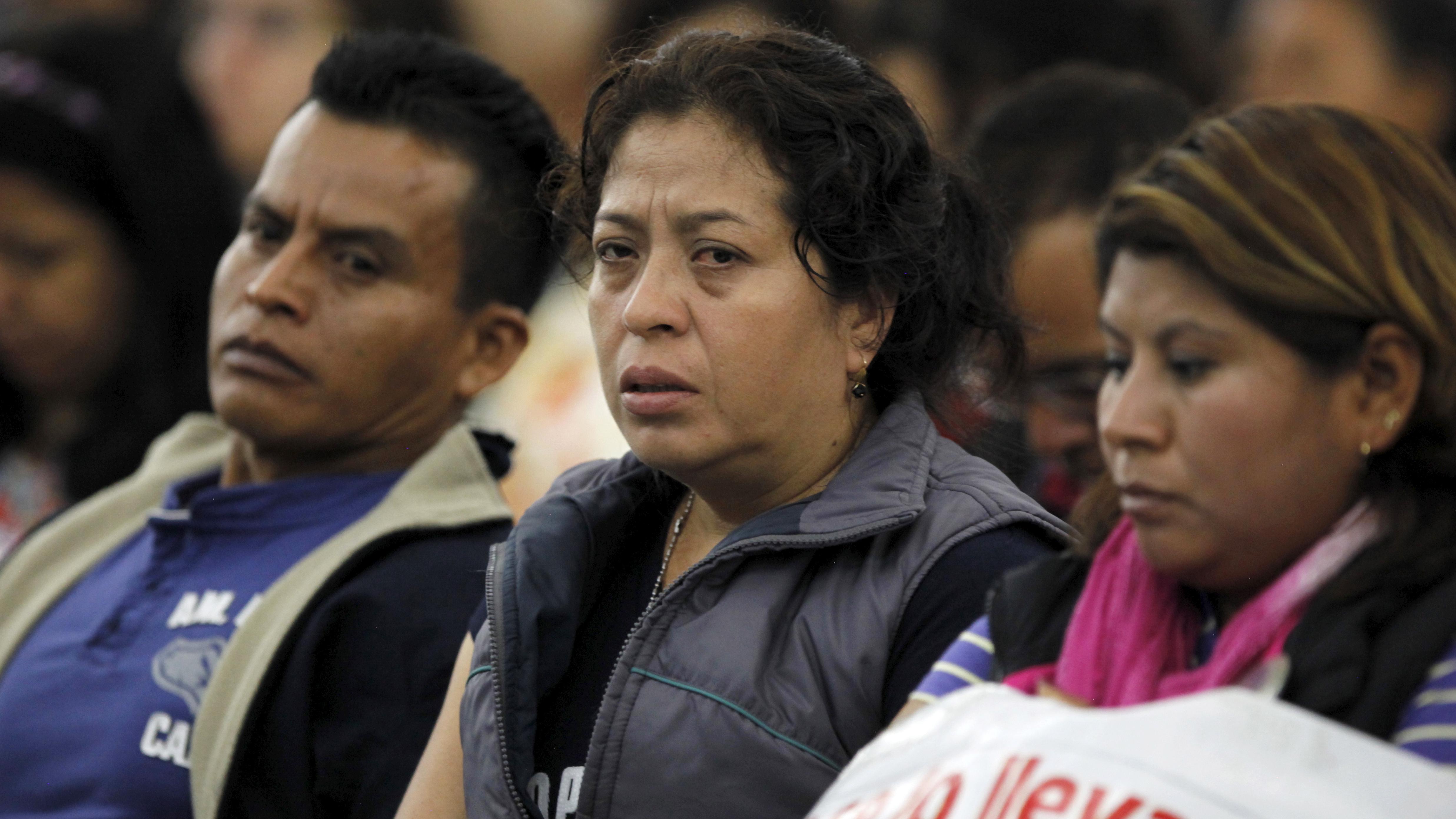 Family members of some of the 43 missing students from the Ayotzinapa teachers' training college attend a report given by members of a team of international experts in Mexico City September 6, 2015.