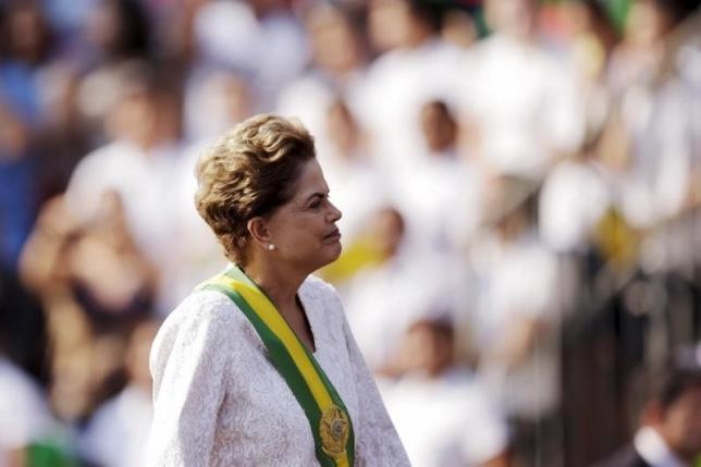 Brazil's President Dilma Rousseff stands in a vehicle during a civic-military parade to commemorate Brazil's Independence Day in Brasilia, Brazil, September 7, 2015.