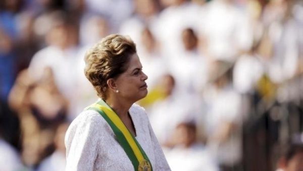 Brazil's President Dilma Rousseff stands in a vehicle during a civic-military parade to commemorate Brazil's Independence Day in Brasilia, Brazil, September 7, 2015.