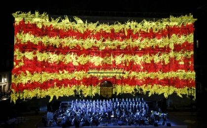 The Catalan flag is seen on the facade of the Palau de la Generalitat during a ceremony to mark 
