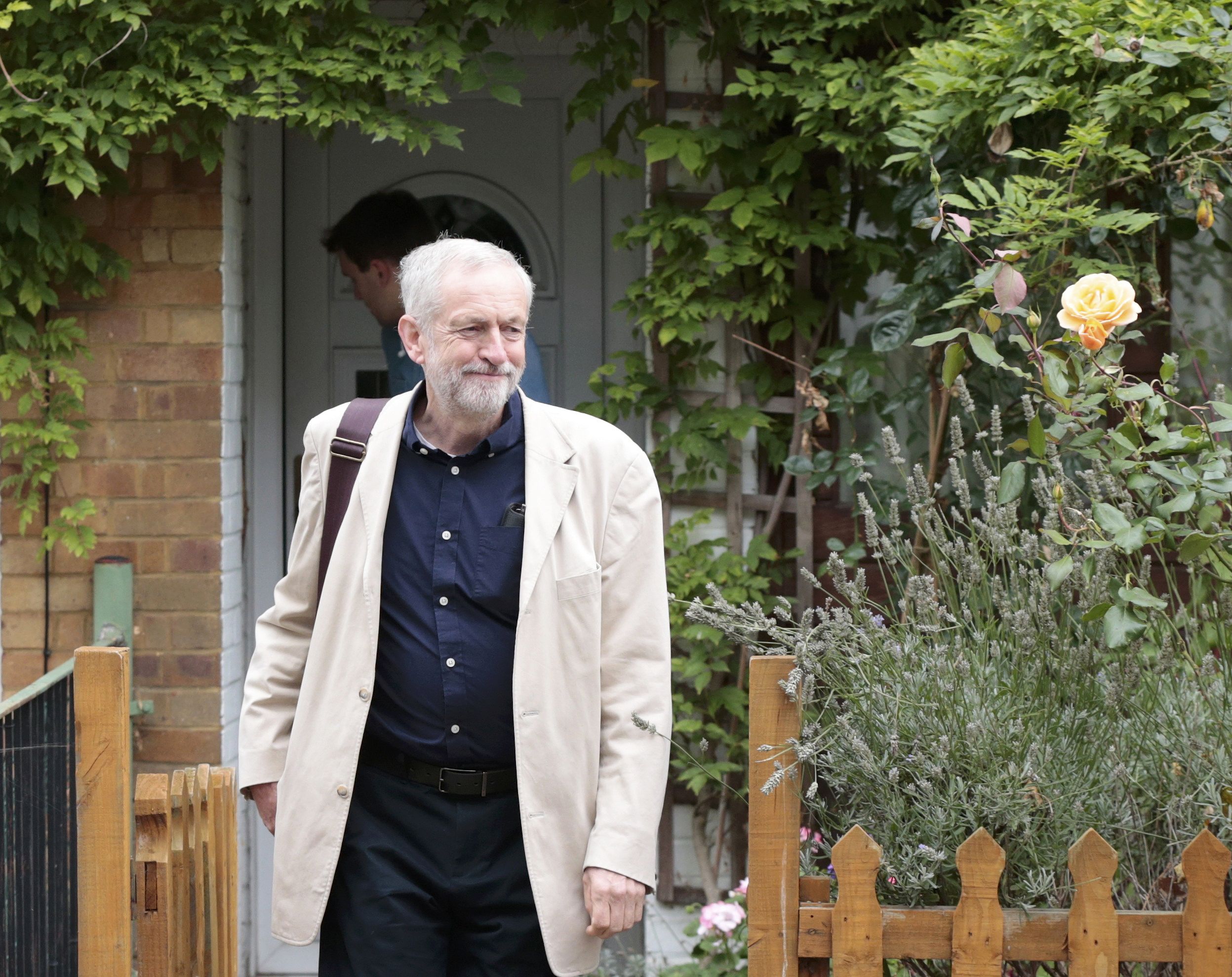 Jeremy Corbyn leaves his home the morning after being elected as the new leader of Britain's opposition Labour Party, in London, September 13, 2015.