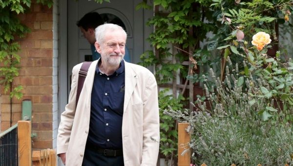 Jeremy Corbyn leaves his home the morning after being elected as the new leader of Britain's opposition Labour Party, in London, September 13, 2015. 