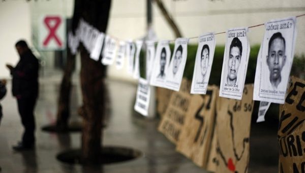 Pictures of the 43 Ayotzinapa students missing since September 2014 during a protest demanding justice