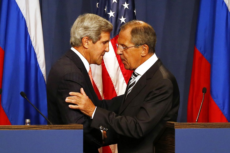 U.S. Secretary of State John Kerry shakes hands with Russian Foreign Minister Sergei Lavrov at a press conference in Geneva.