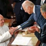 Pope Francis is greeted by Vice President Joe Biden in the House chamber prior to addressing a joint meeting of the congress.