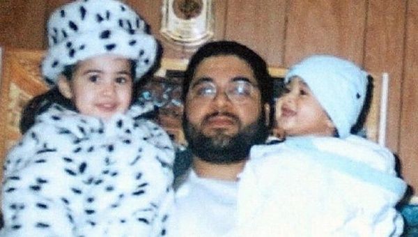 Shaker Aamer pictured before his arrest in 2002 with his children.