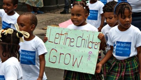 Children march against violence as part of the 'Break the Silence' campaign