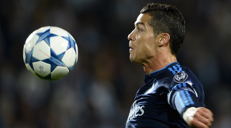 Real Madrid's Christian Ronaldo controls the ball during their Champions League group A match against Malmo in Sweden, Oct. 1, 2015.
