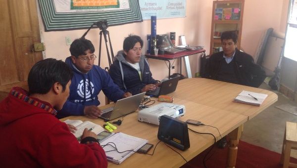 Aymara translators hard at work at their office in La Paz