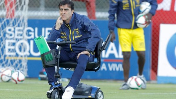 Ecuador's coach Gustavo Quinteros takes part in a training session.