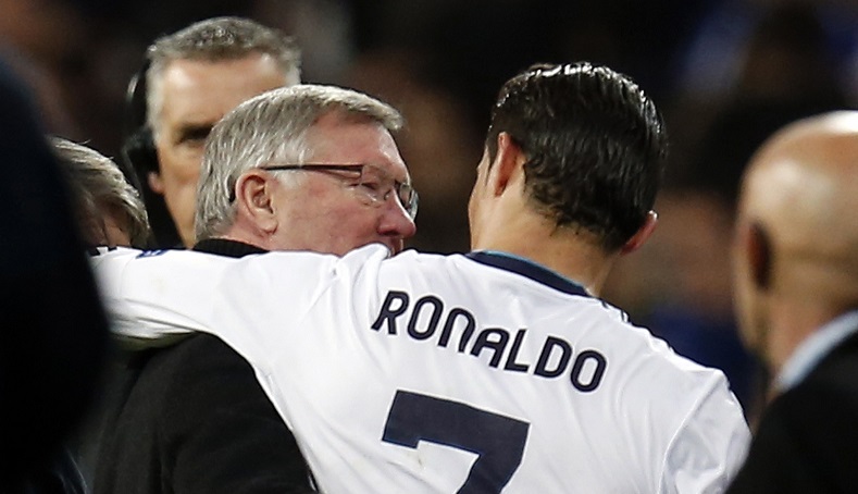 Former Manchester United coach Sir Alex Ferguson and Cristiano Ronaldo hug after a game.