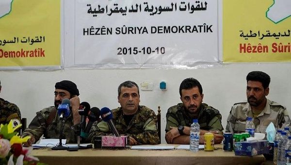 Leaders of the Syrian Democratic Force deliver a statement in a joint press conference. 