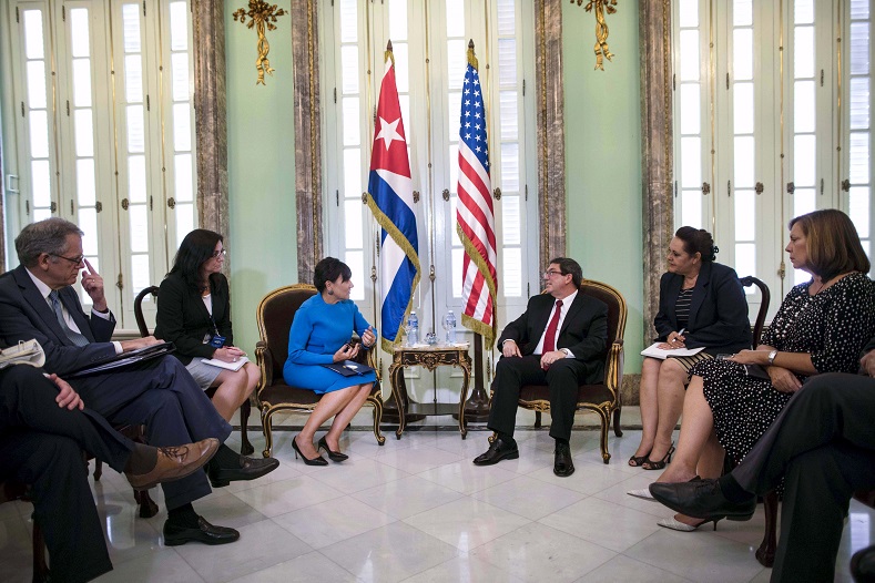 U.S. Commerce Secretary Penny Pritzker (3rd L) talks with Cuba's Foreign Minister Bruno Rodriguez (3rd R) during a meeting in Havana, October 7, 2015.