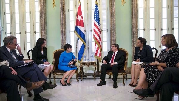 U.S. Commerce Secretary Penny Pritzker (3rd L) talks with Cuba's Foreign Minister Bruno Rodriguez (3rd R) during a meeting in Havana, October 7, 2015.