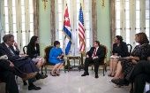 U.S. Commerce Secretary Penny Pritzker (3rd L) talks with Cuba