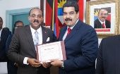 Venezuelan President Nicolas Maduro and Antigua and Barbuda Prime Minister Gaston Browne present an agreement signed between the two countries.