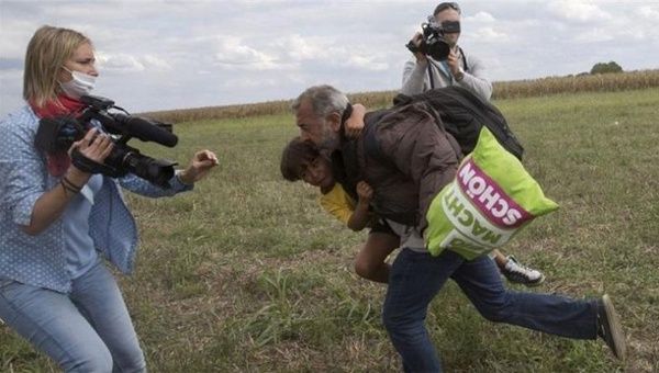 The camerawoman says she and her family are planning to move to Russia as Hungary has become 