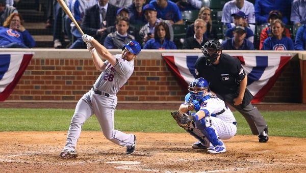  New York Mets second baseman Daniel Murphy hits a two-run home run against the Chicago Cubs in the 8th inning in game four of the NLCS at Wrigley Field.