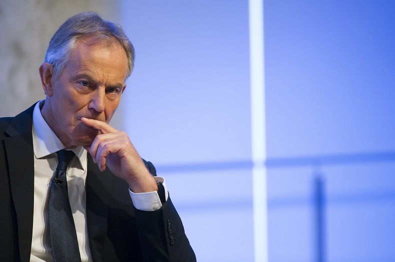 Former British Prime Minister Tony Blair listens to a question during an appearance at the 9/11 Memorial Museum in New York City, October 6, 2015.