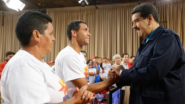 Venezuelan President Nicolas Maduro greets graduates of the Robin Mission program at an event to commemorate its 12-year anniversary, Venezuela, July 1, 2015.