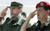 The agreement was signed 15 years ago by the then presidents of Cuba, Fidel Castro (R) and Venezuela Hugo Chavez (L). 