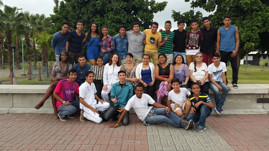 Ecuadorean lawmaker Gina Godoy poses with a group of delegates at last weekend's youth climate summit.