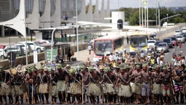 Brazilian Indians from various Indigenous ethnic groups take part in a protest during a national Indigenous mobilization in Brasilia, in April. 