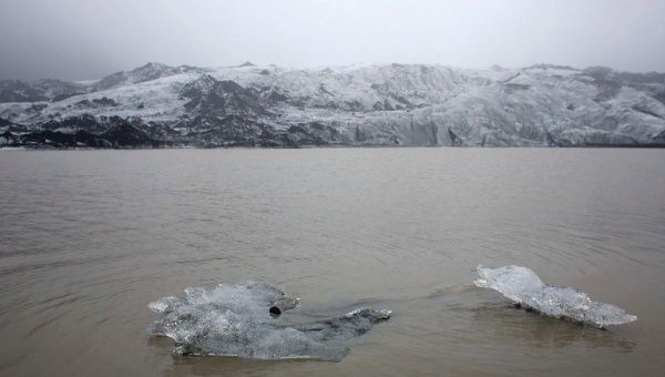 Ice flow floating in front of Iceland's Solheimajokull Glacier, where the ice has receded by more than 1 kilometer since annual measurements began in 1931.