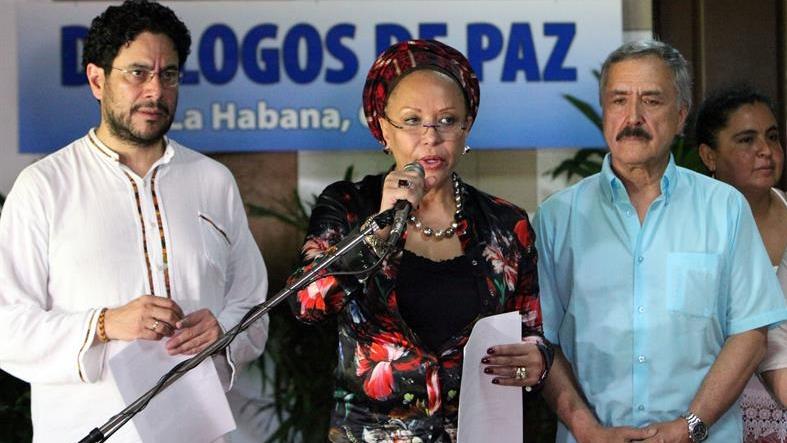 Colombian Senator Ivan Cepeda (L) and peace activist Piedad Cordoba (C) address peace negotiators in Havana on behalf of Colombia's Broad Front for Peace.
