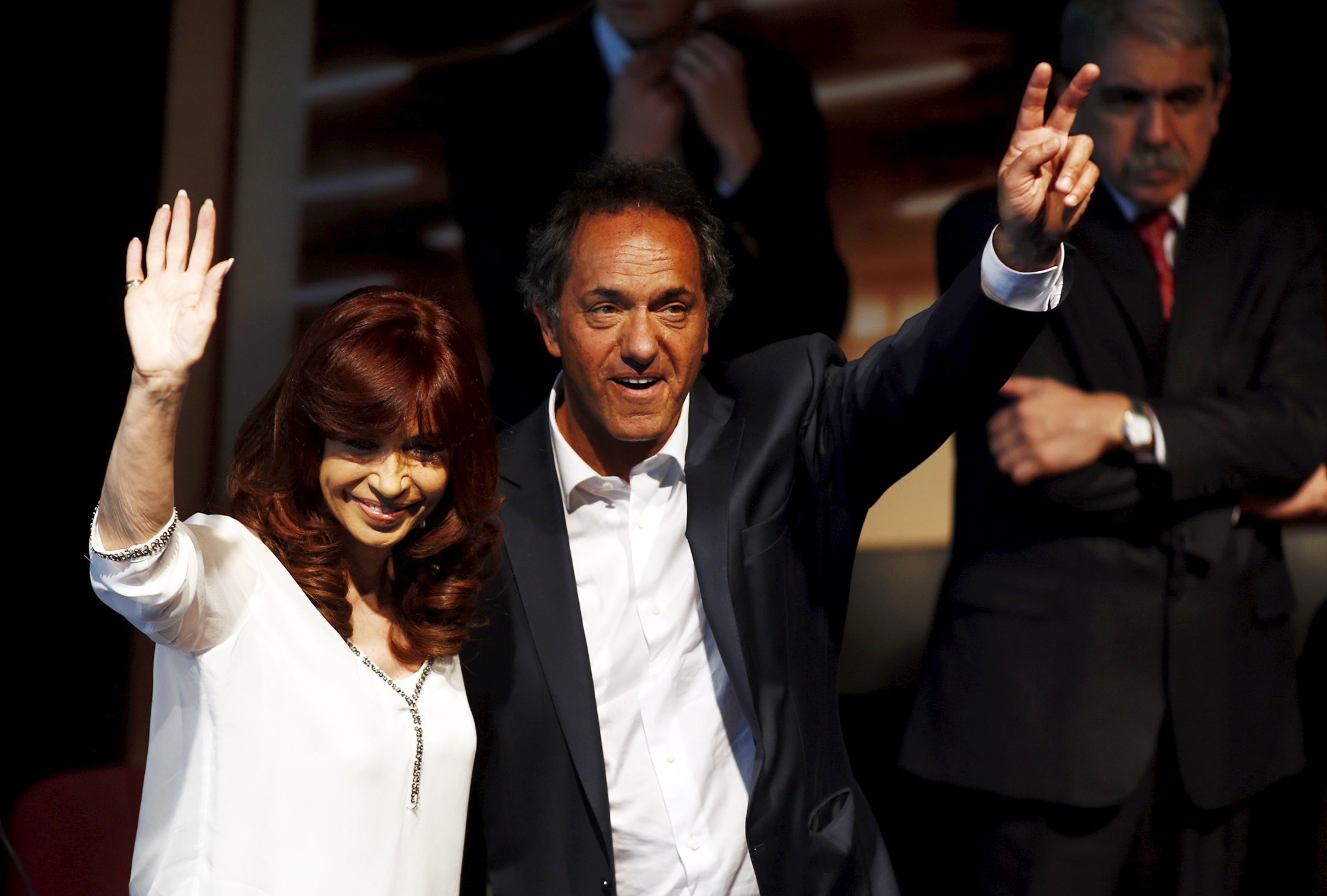 Argentina's President Cristina Fernandez and presidential candidate Scioli gesture during a ceremony in Buenos Aires.